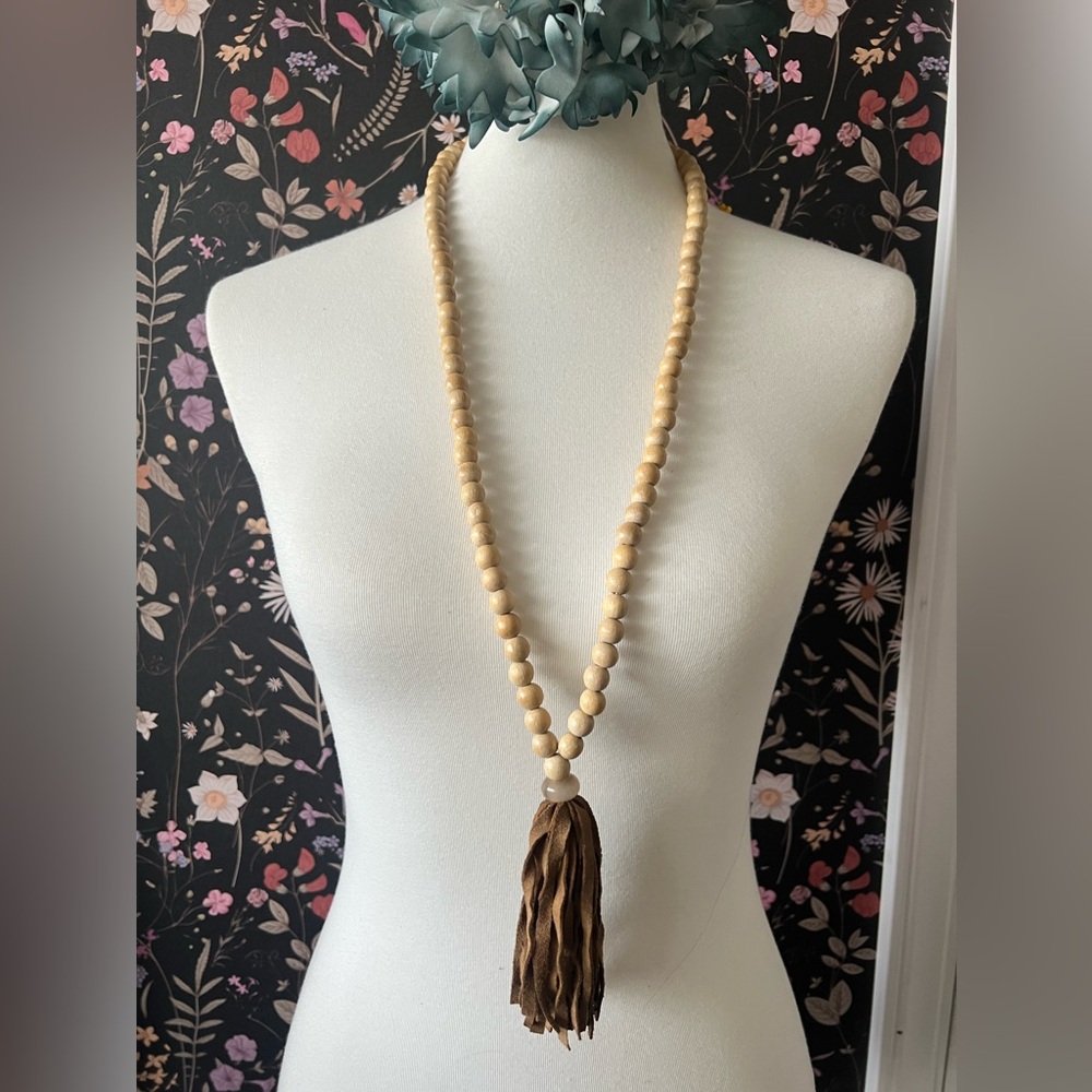 Wooden bead necklace with suede tassel